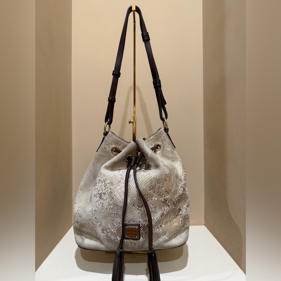Dooney & Bourke Handbags - Dooney & Bourke Neutral Snake-Print Drawstring Bucket Bag *read for condition*